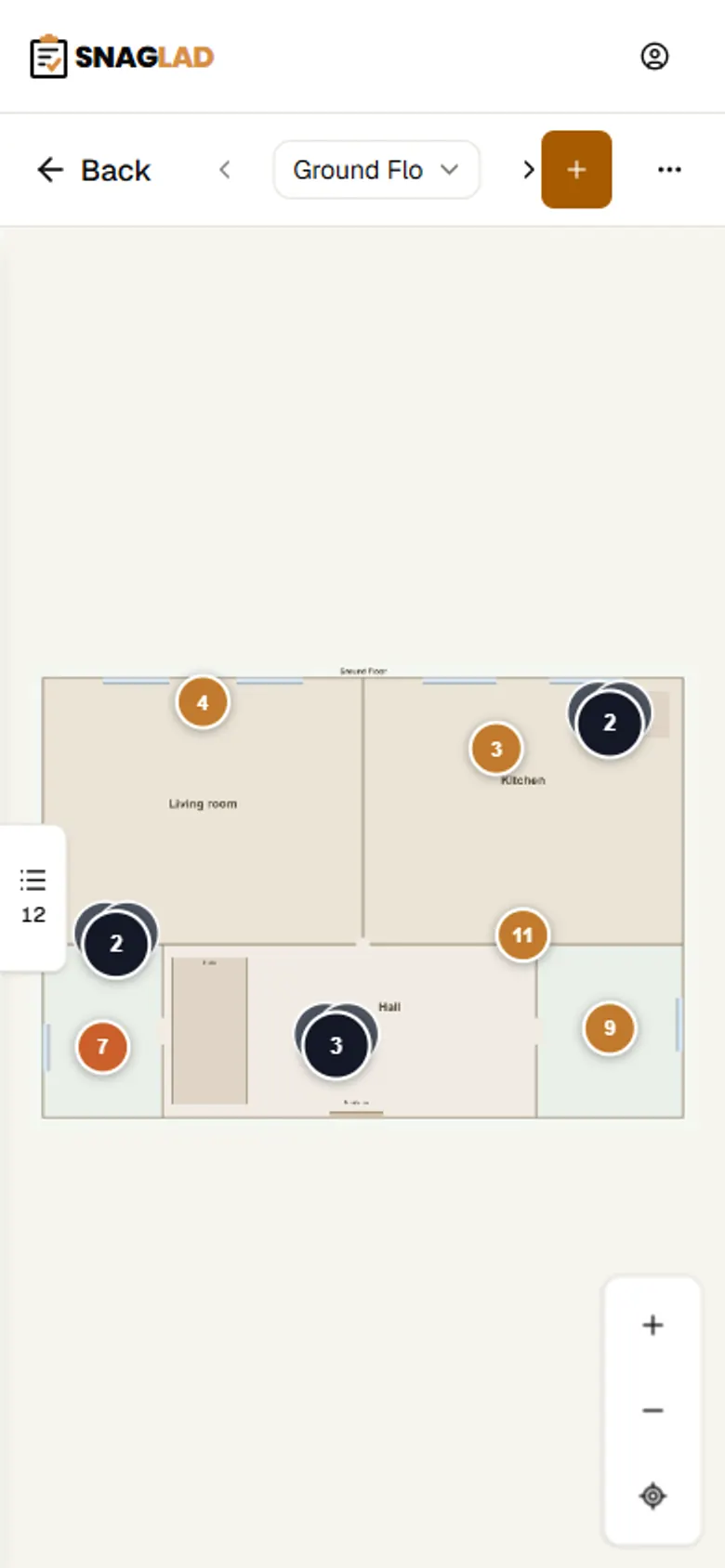 Phone view of a floor plan in Snaglad with numbered snag pins on the rooms.